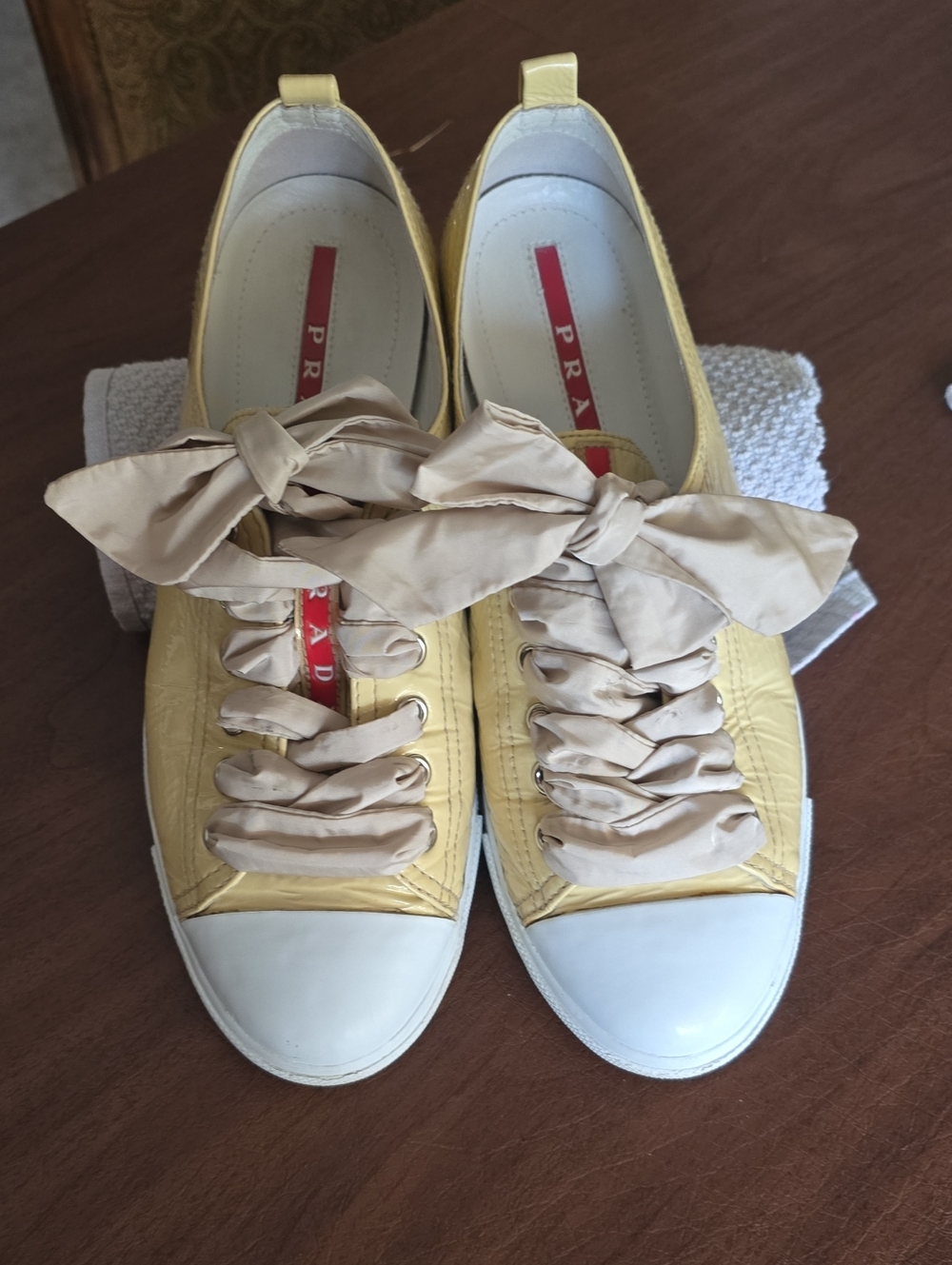 Prada Patent Leather Pale Yellow Sneakers with Tan Ribbon
